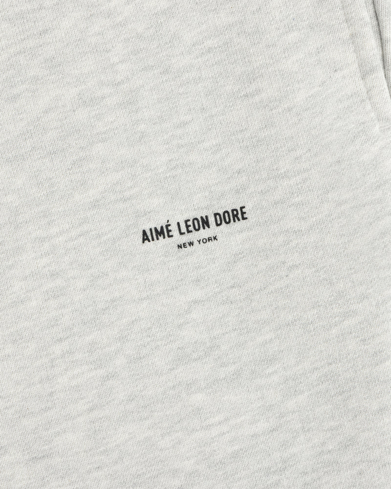 Light gray Micro Logo Sweatpants with small black AIMÉ LEON DORE NEW YORK text at the center.