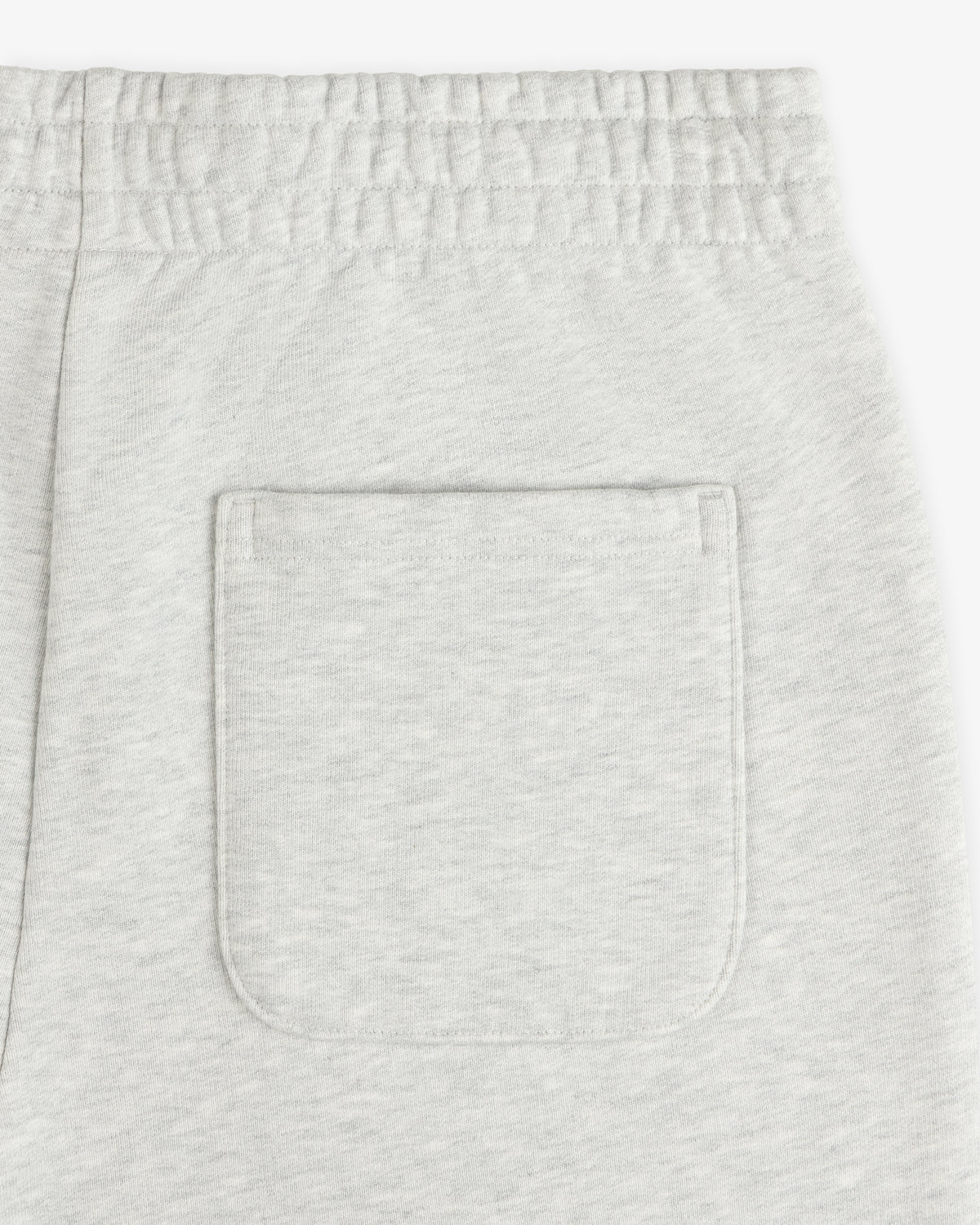 Detail of Micro Logo Sweatpants featuring light gray color, elastic waistband, and one back patch pocket.
