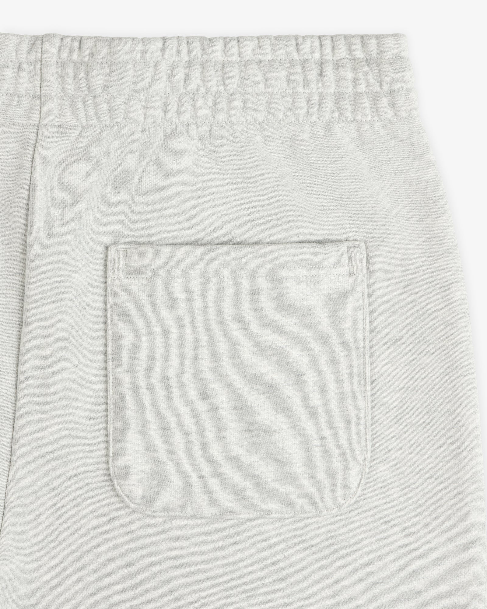 Detail of Micro Logo Sweatpants featuring light gray color, elastic waistband, and one back patch pocket.