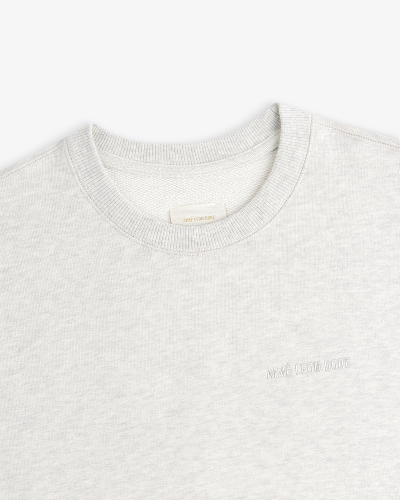 Light gray Tonal Logo Crewneck Sweatshirt with chest embroidery, shown flat on a white background.