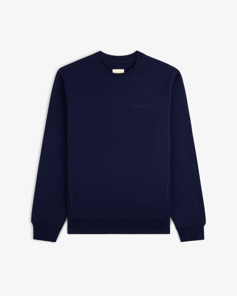 Tonal Logo Crewneck Sweatshirt in navy displayed on a white background.