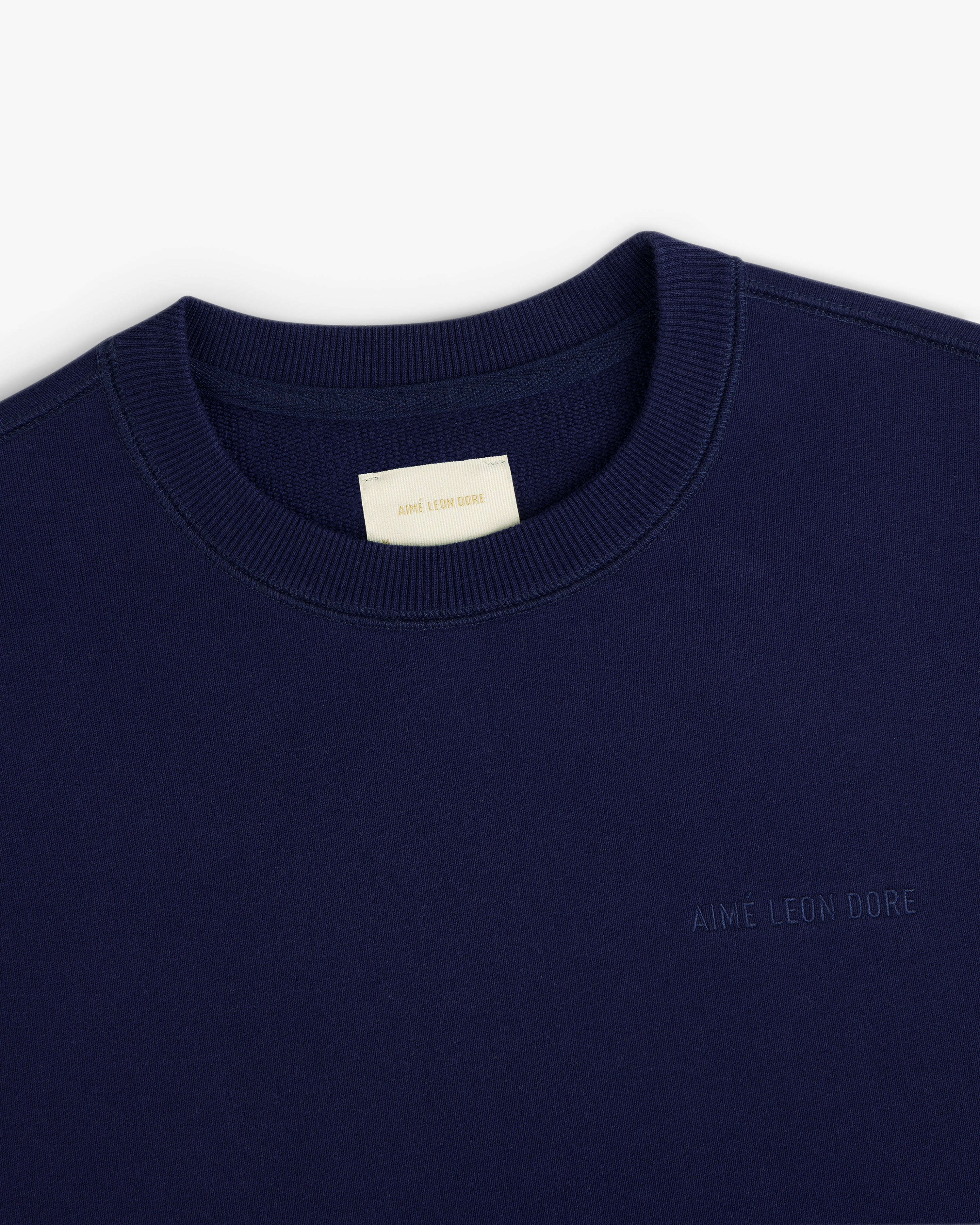 Navy Tonal Logo Crewneck Sweatshirt with AIMÉ LEON DORE chest embroidery and branded neck tag.