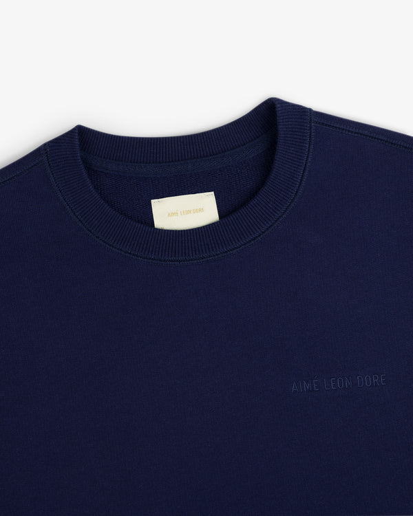 Navy Tonal Logo Crewneck Sweatshirt with AIMÉ LEON DORE chest embroidery and branded neck tag.