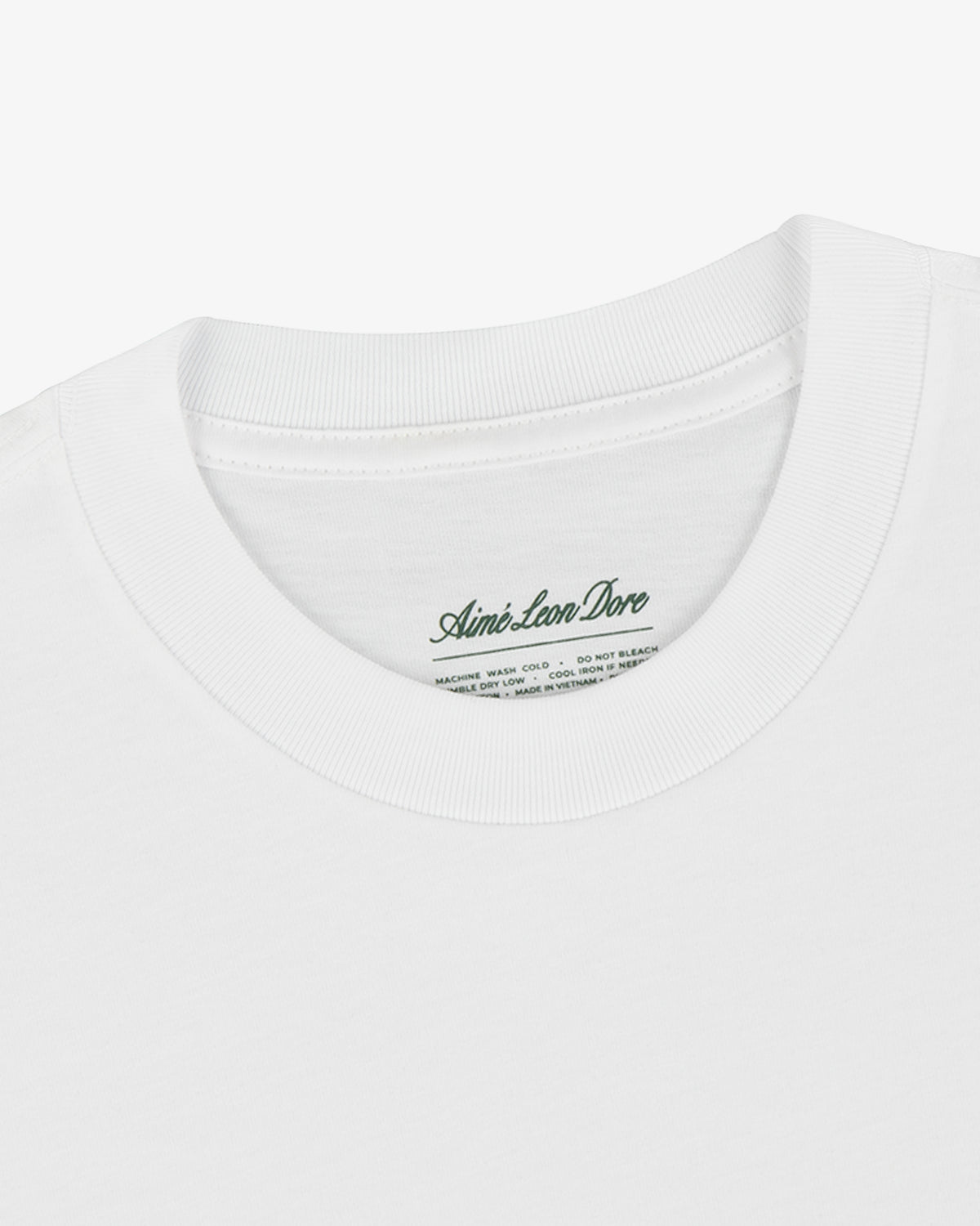 White crewneck t-shirt from the T-Shirt 3-Pack with a visible Aimé Leon Dore label inside the collar.