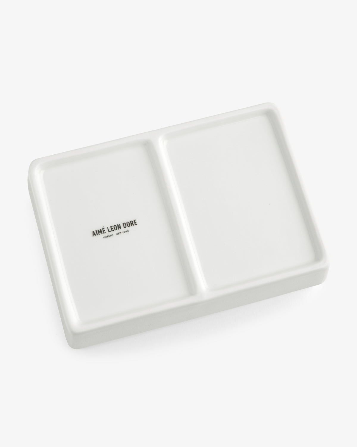 Mulberry Catchall Box: rectangular white ceramic tray with two sections and AIMÉ LEON DORE text in one section.