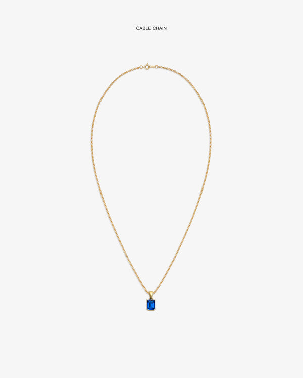 14Kt Gold Gemstone Pendant with rectangular blue stone on gold cable chain, displayed on white background.
