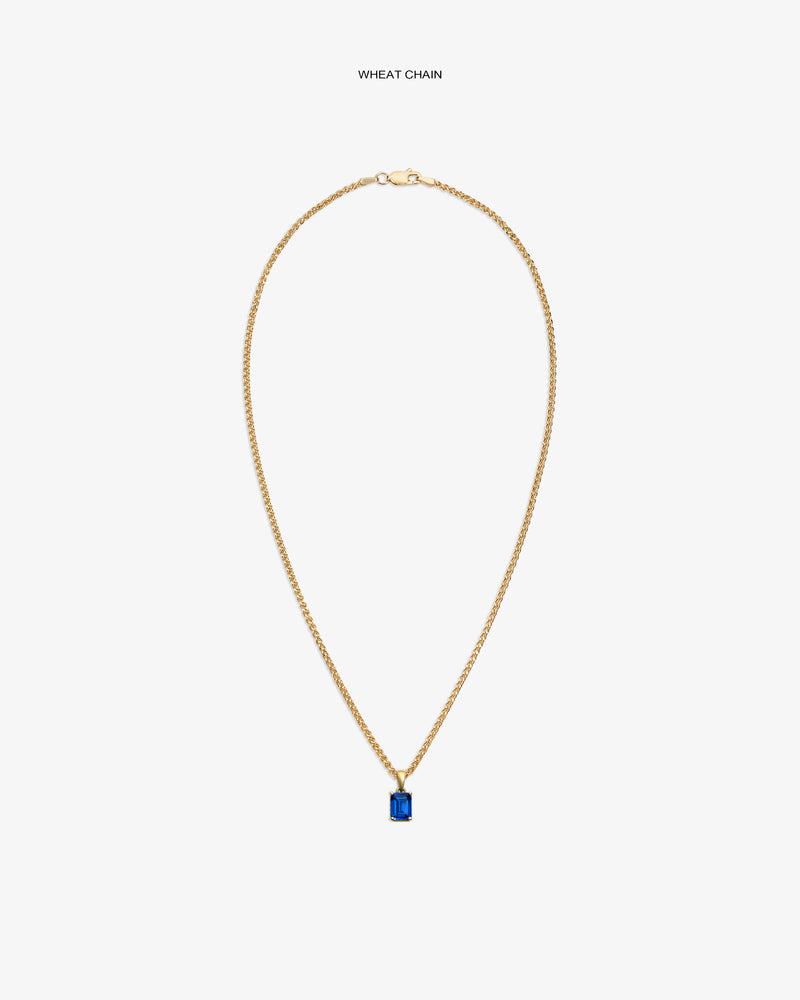 14Kt Gold Gemstone Pendant on a wheat chain, featuring a rectangular blue stone, shown on a white background.