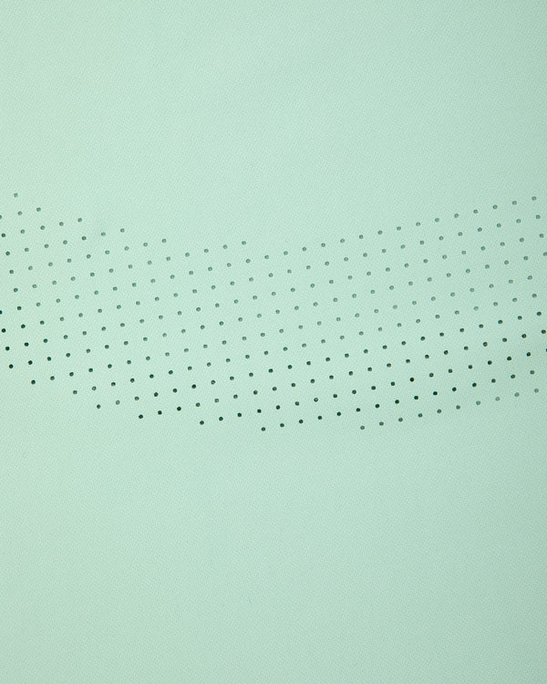 Aimé Performance Tank Top in light green with small black dots in a curved, fading pattern across the center.