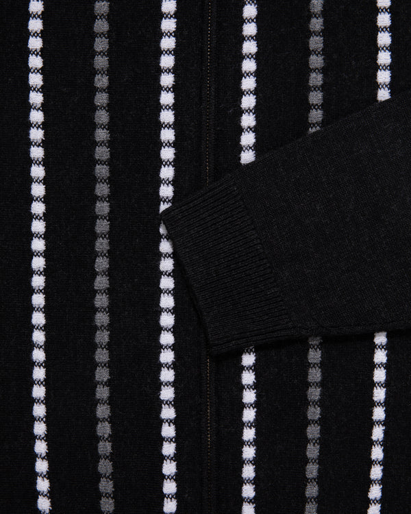 Jacquard Stripe Polo Cardigan: Black with vertical white & gray dotted stripes and a long sleeve crossing diagonally.