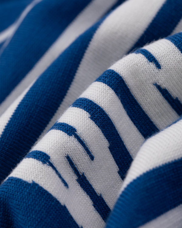 Close-up of WINDSTOPPER® Striped Knit Cycling Jersey by GORE-TEX LABS, showing its blue and white textured knit.
