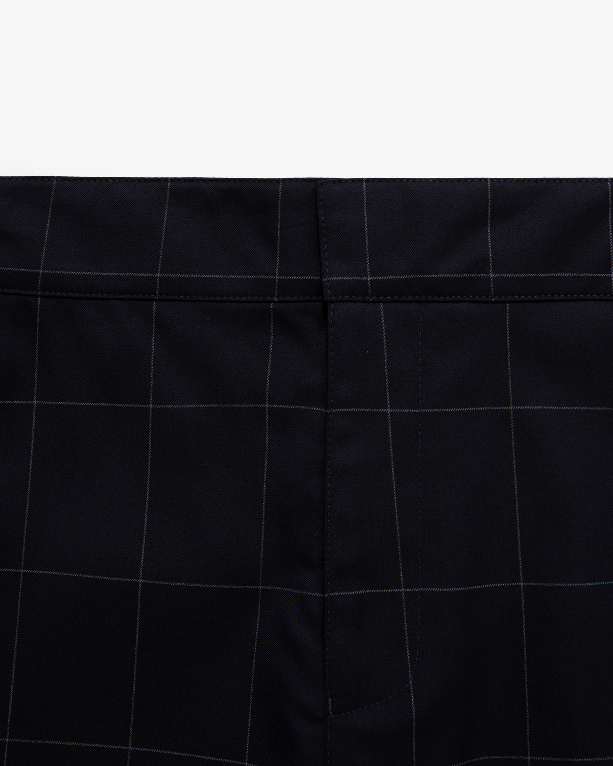 Close-up of Windowpane Elasticated Waist Suit Trouser in navy with white check pattern and waistband seam.