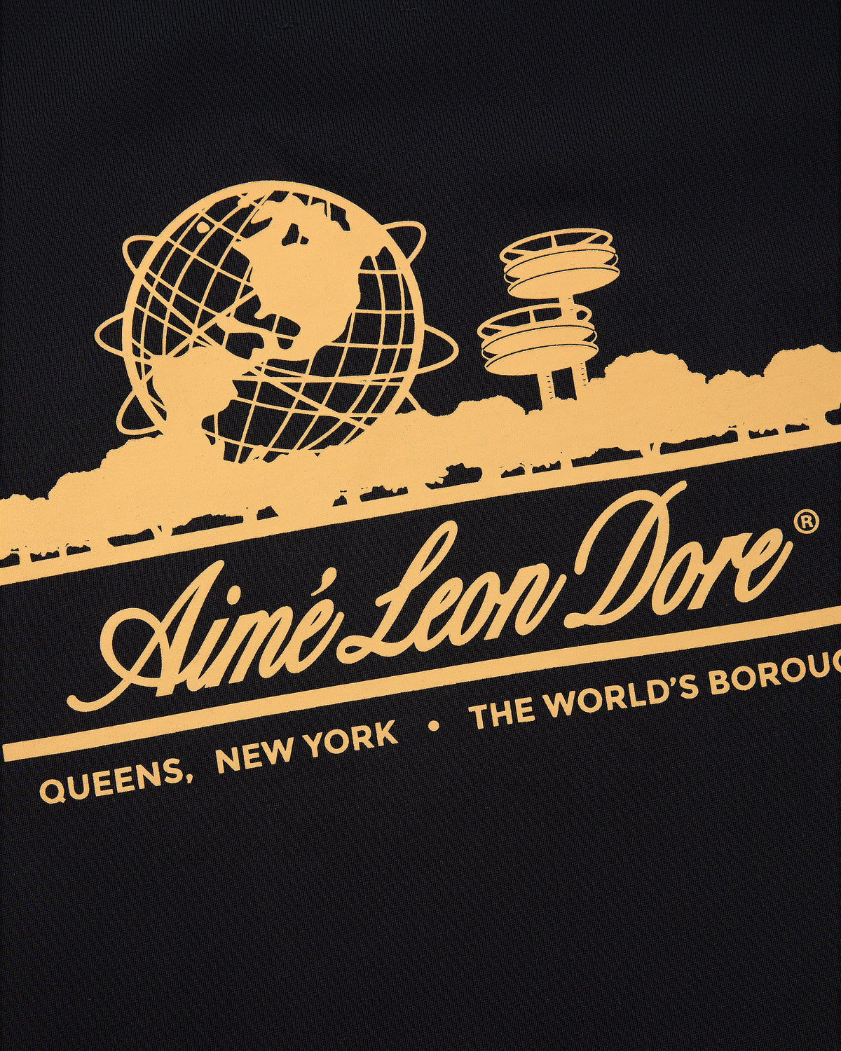 Yellow graphic of globe, pavilion, and skyline with "Unisphere Hoodie" text by Aimé Leon Dore, Queens, New York.