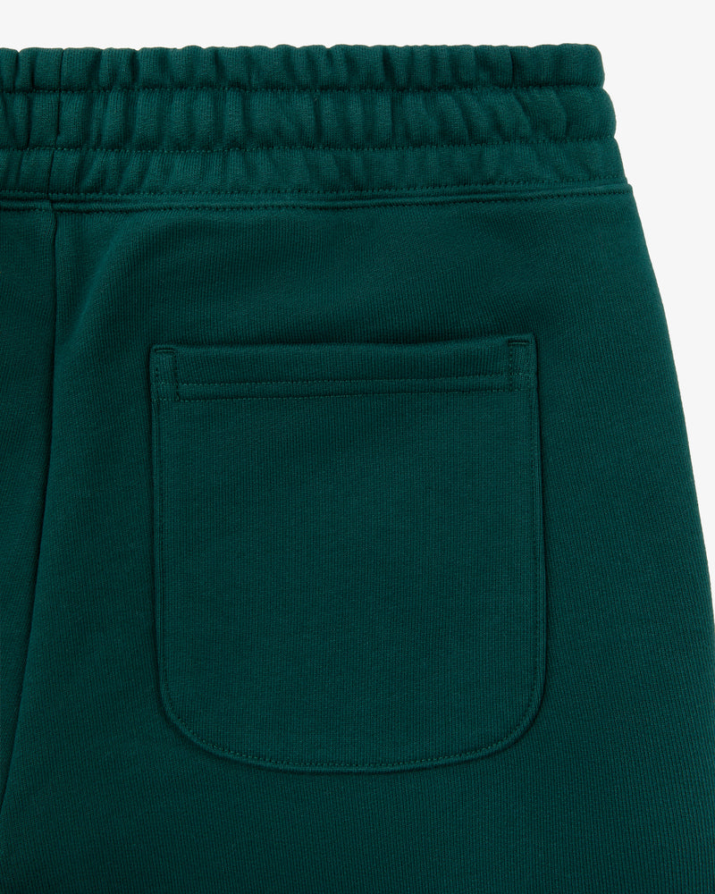 Close-up of the back pocket and waistband of Unisphere Sweatpants in dark green with visible stitching details.