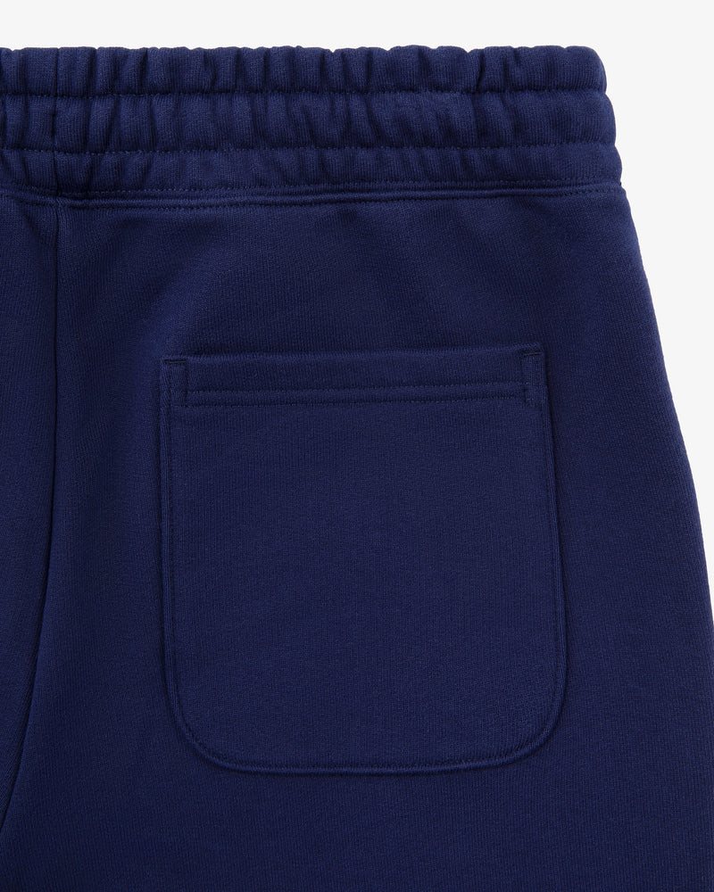 Close-up of Unisphere Sweatpants in navy blue, highlighting the back pocket and elastic waistband.