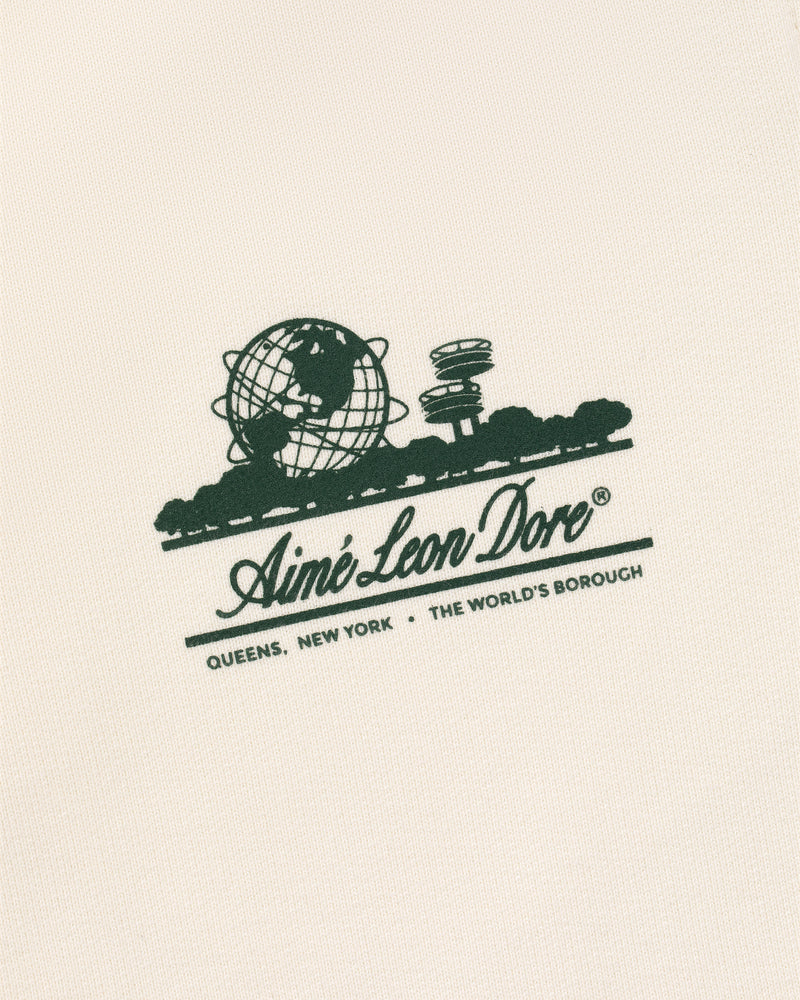 Cream fabric Unisphere Sweatpants with green Unisphere graphic and text: Aimé Leon Dore, Queens, New York, The World's Borough.