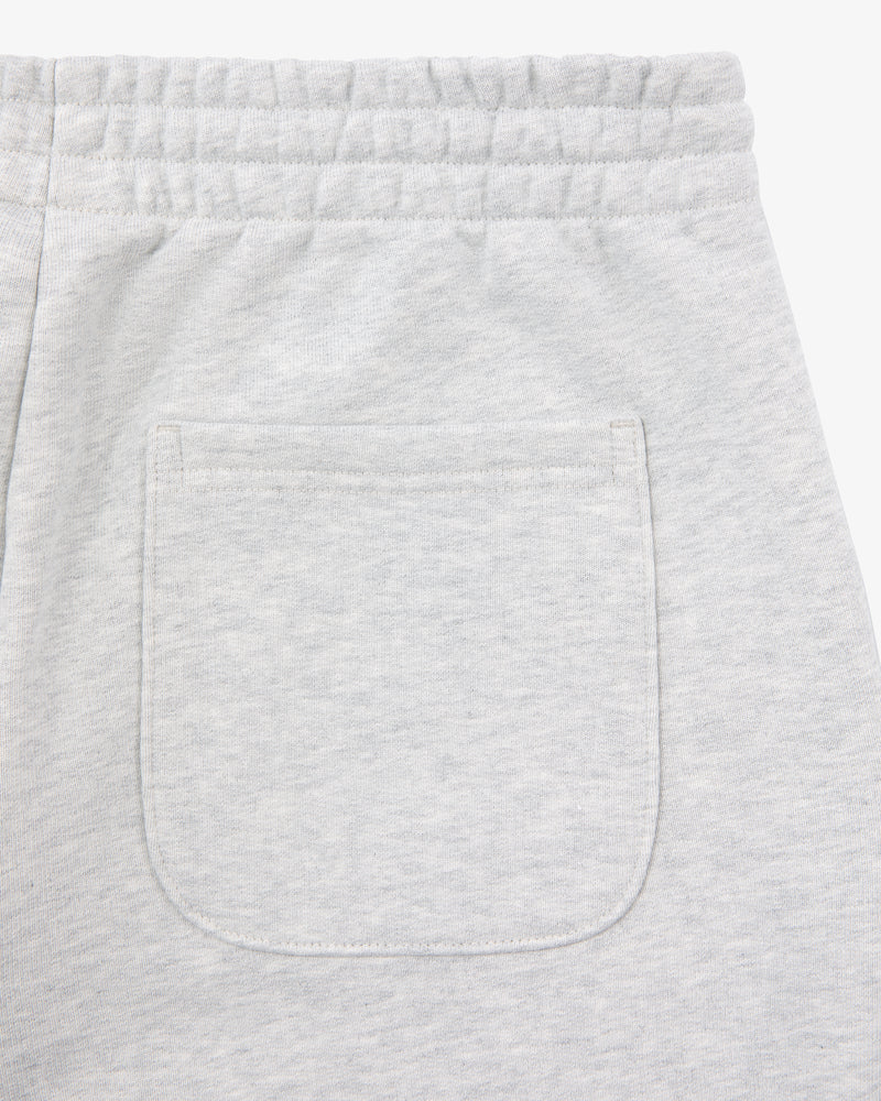 Close-up of the back pocket and waistband on Micro Logo Sweatpants in light gray with an elastic waist.