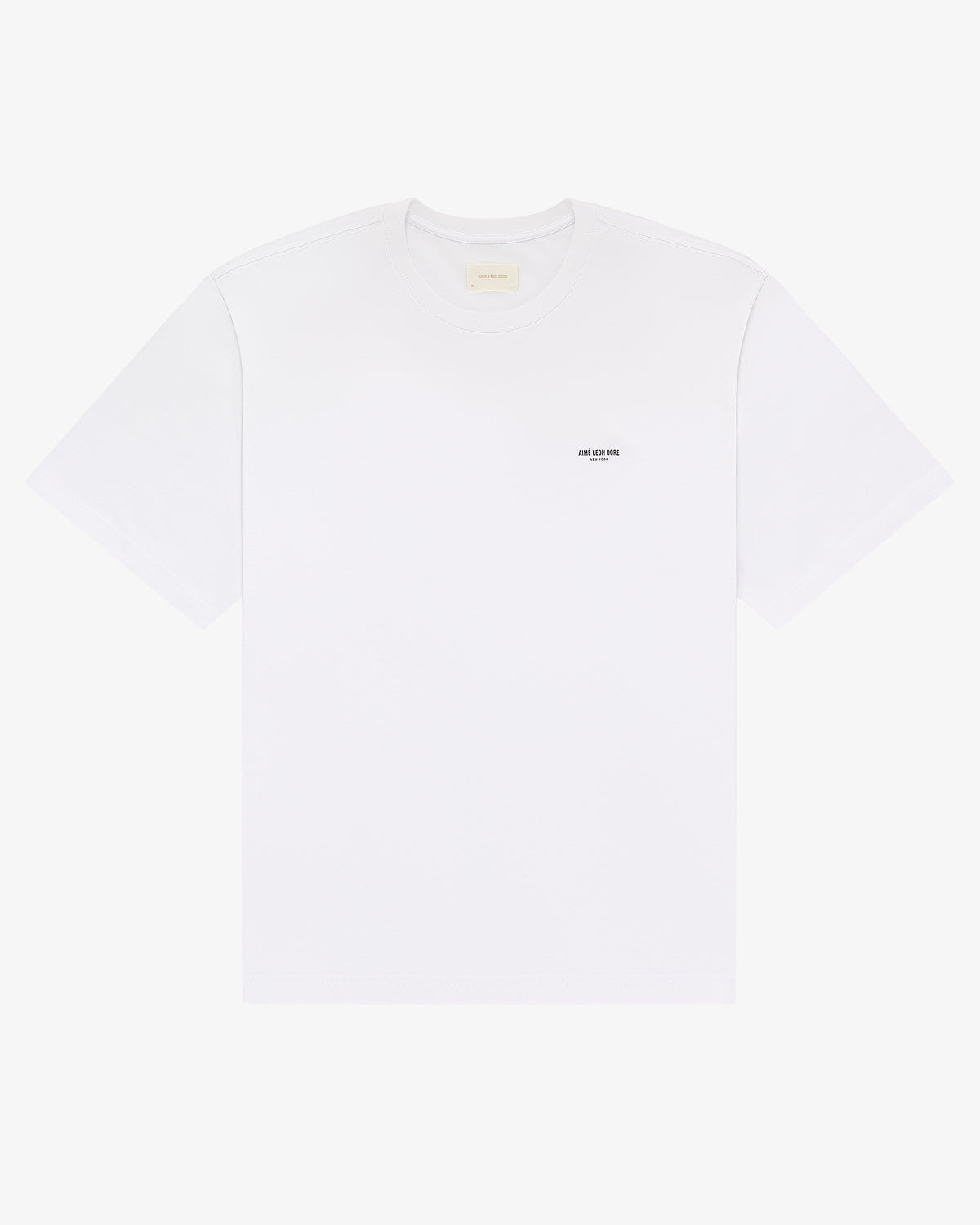 Micro Logo Tee: plain white short-sleeve t-shirt with a small black logo on the left chest.
