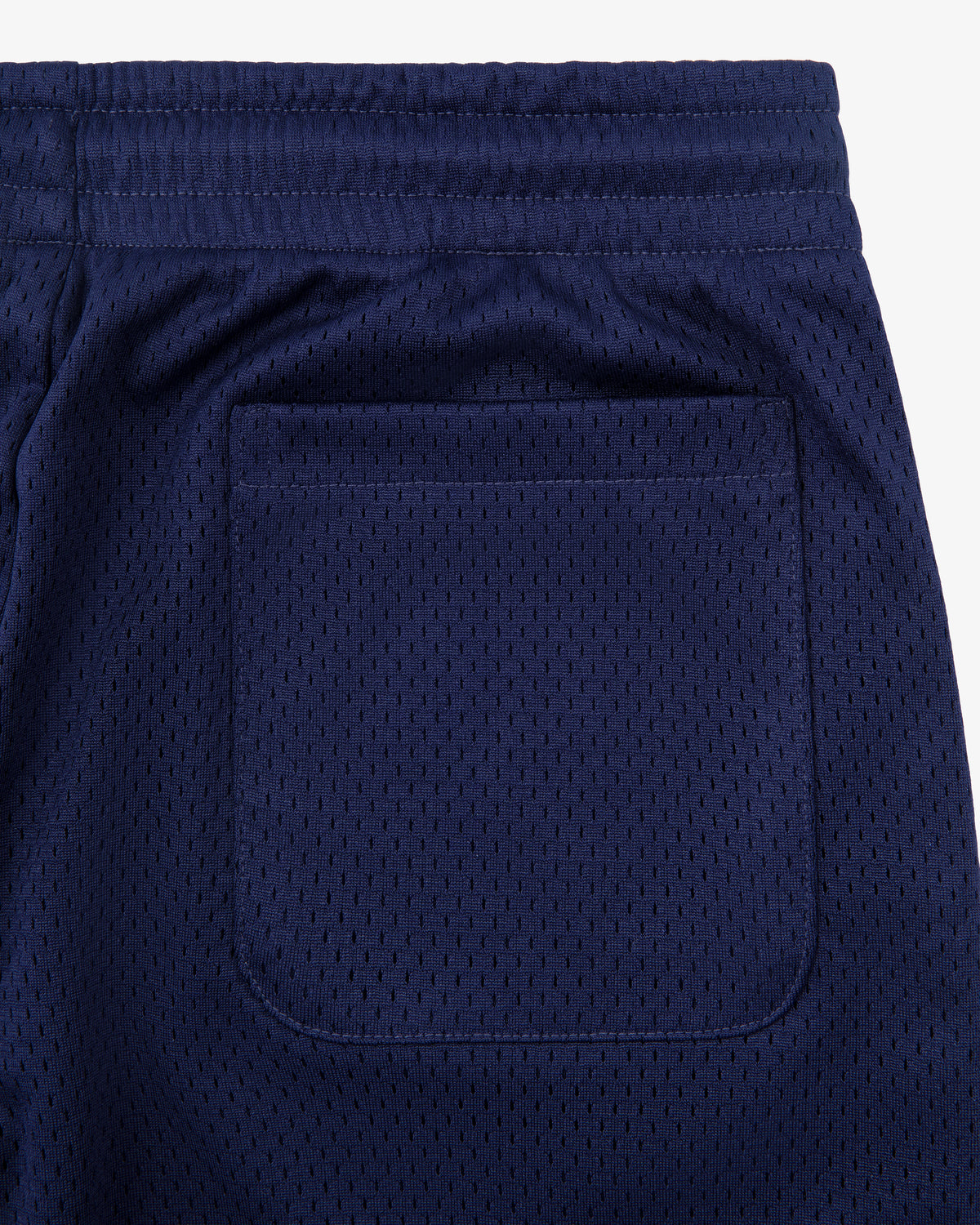 Close-up of the Logo Gym Short in navy blue mesh with an elastic waistband and a square back pocket.