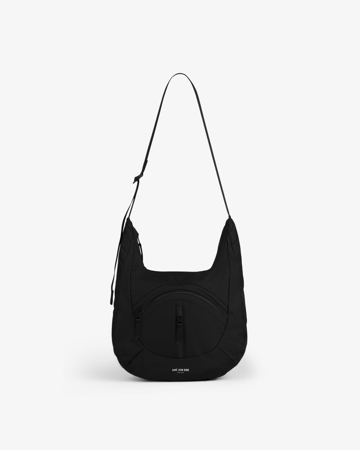 Nylon Messenger Bag in black, crescent-shaped with front zipper pocket and adjustable strap on white background.