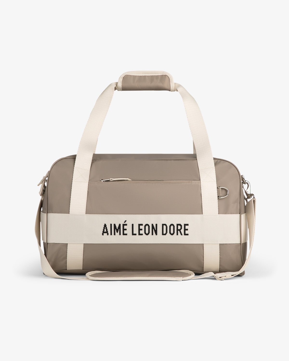 Nylon Duffle Bag in beige with white straps and "AIMÉ LEON DORE" on front, shown on a white background.