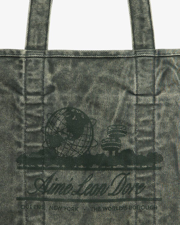 Close-up of the Sun Faded Large Unisphere Tote Bag with a printed globe, books, and "Aim-Lan Doe" on the front.
