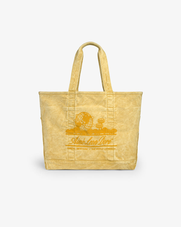Sun Faded Large Unisphere Tote Bag with two handles, globe graphic, and “Aimé Leon Dore” logo on the front.