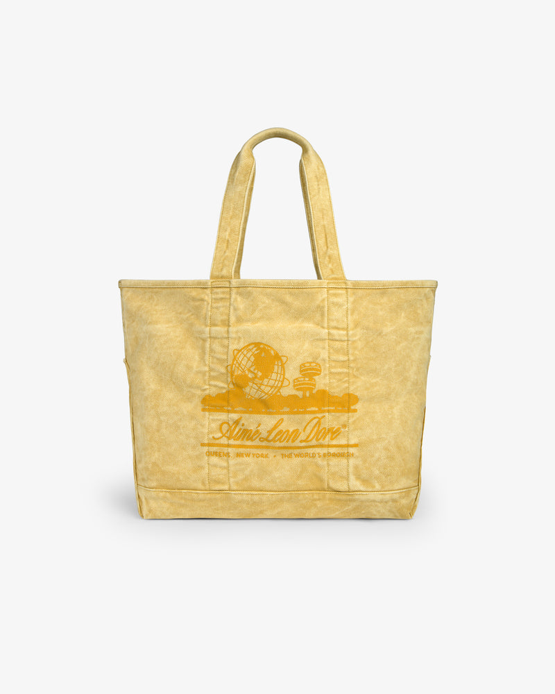 Sun Faded Large Unisphere Tote Bag with two handles, globe graphic, and “Aimé Leon Dore” logo on the front.