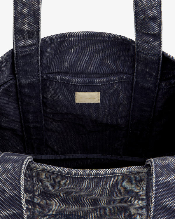 Sun Faded Large Unisphere Tote Bag in navy, open with sturdy handles and inner label, shown on a white background.