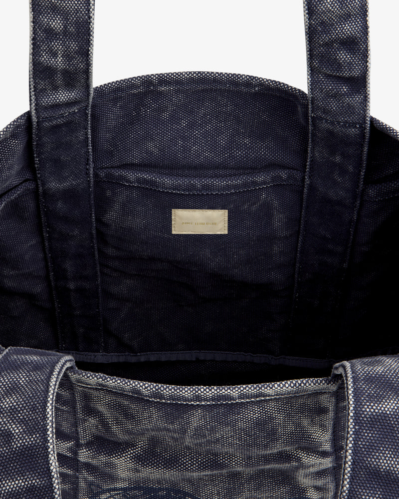 Sun Faded Large Unisphere Tote Bag in navy, open with sturdy handles and inner label, shown on a white background.