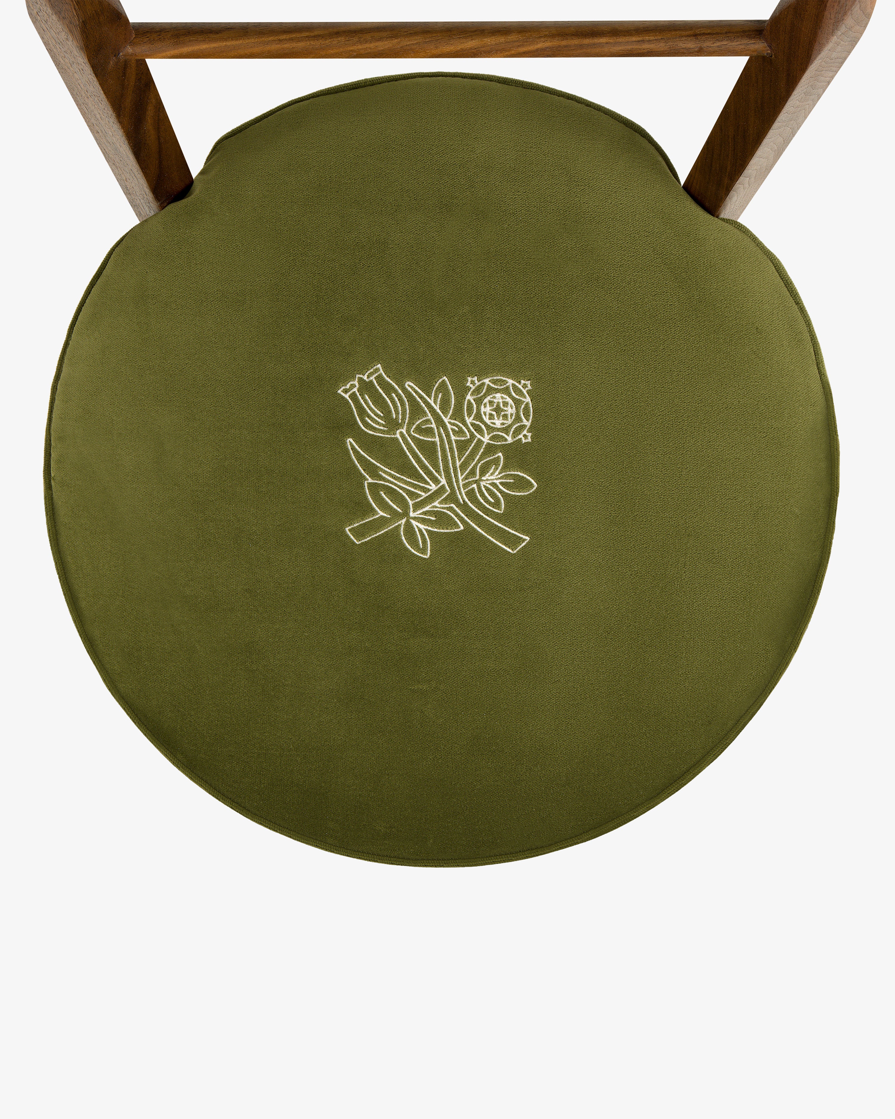 Queens Crest Valet Chair with green round seat and white floral embroidery, viewed from above on white background.