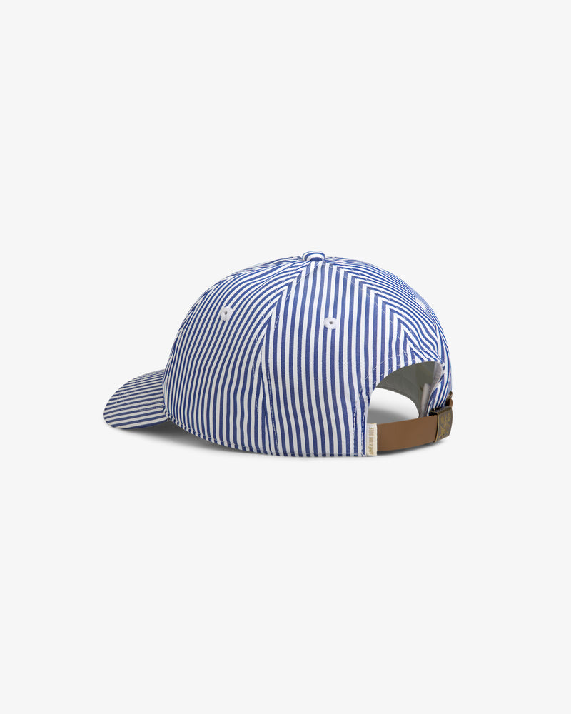 Striped Crest Logo Hat in blue and white, shown from the back with a tan adjustable strap and metal buckle.