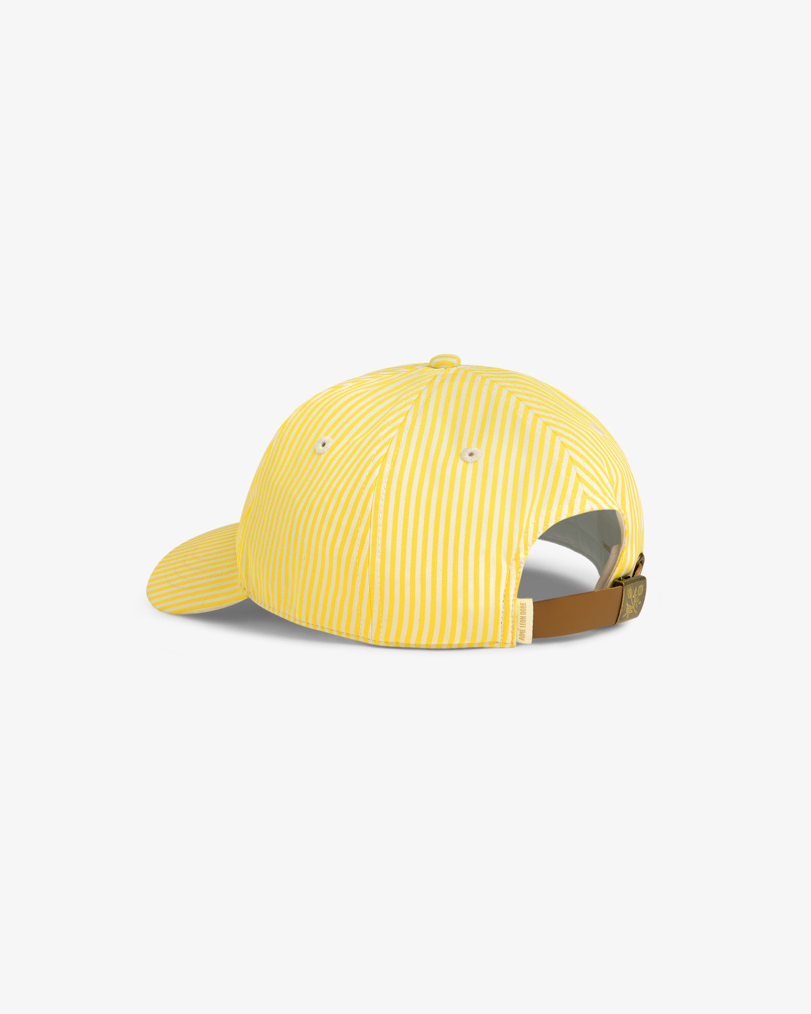 Striped Crest Logo Hat in yellow and white, shown from the back with adjustable brown strap and brass buckle.