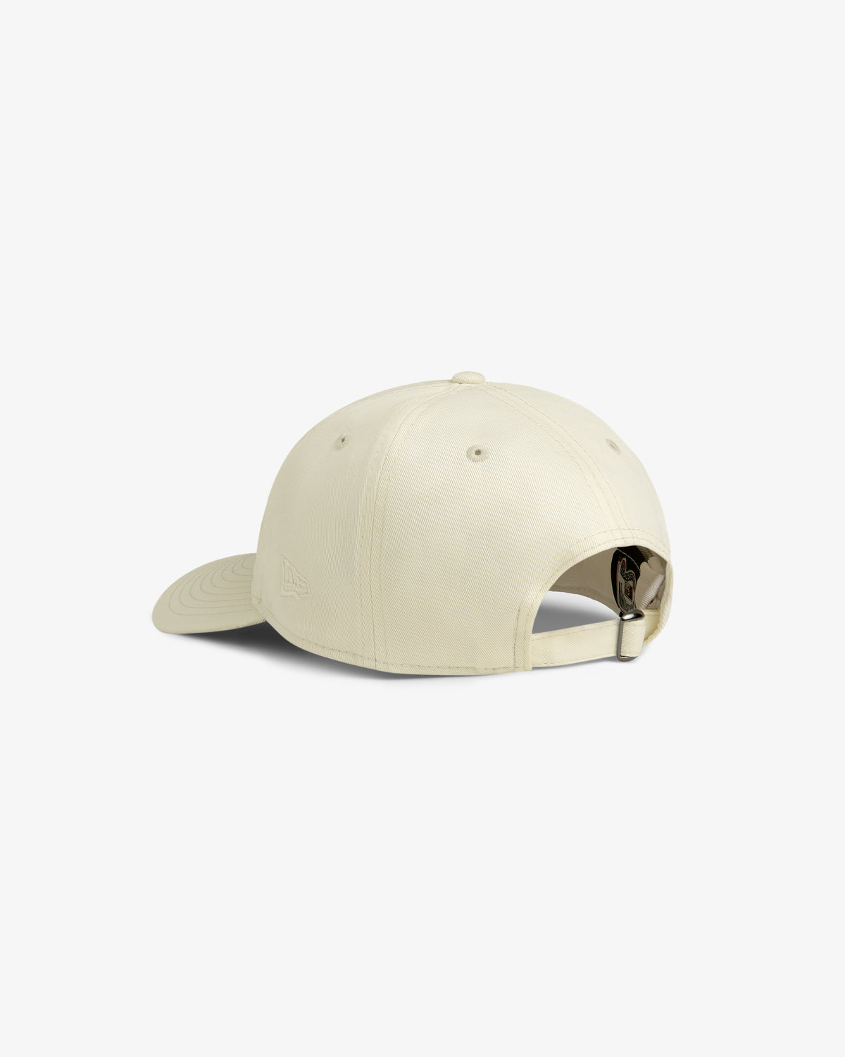 ALD / New Era Yankees Retro Fit Hat in beige, shown from the back with an adjustable strap and metal buckle.