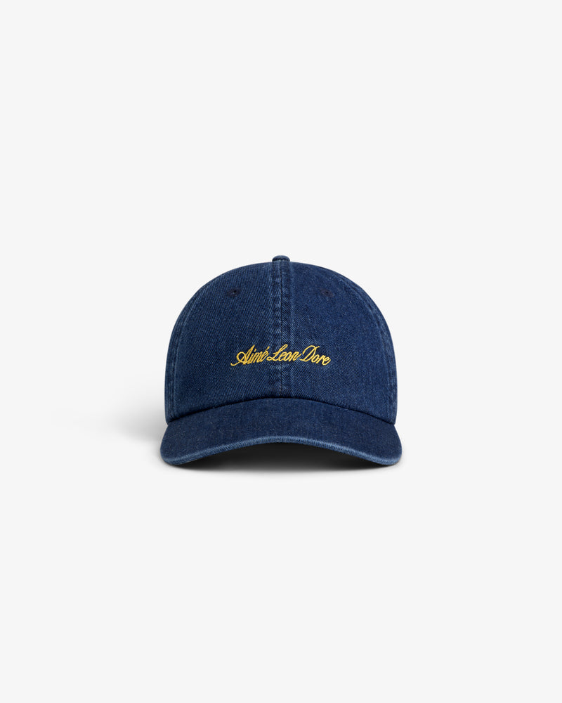Denim Script Hat in navy blue with yellow embroidered script, displayed on a plain white background.