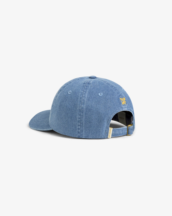 Light blue Denim Script Hat shown from the back, featuring a small yellow eagle above the adjustable strap.