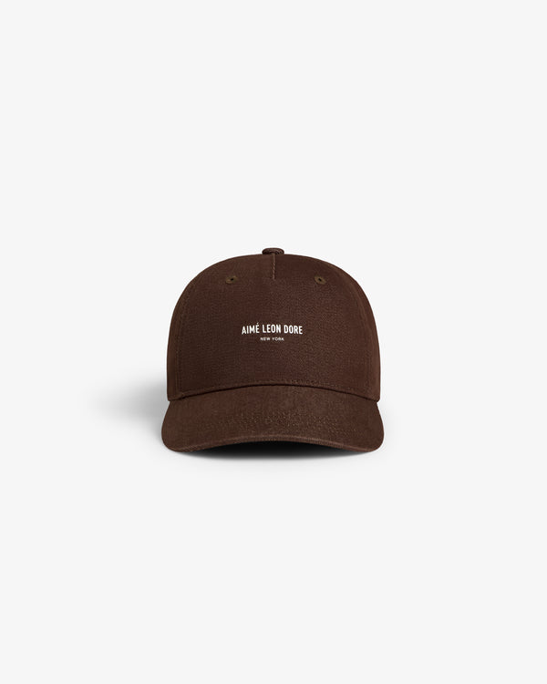Vintage Micro Logo Hat in brown with AIME LEON DORE NEW YORK in white text on front, shown on plain background.