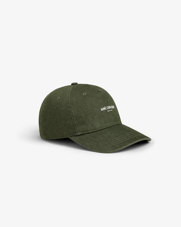 Vintage Micro Logo Hat in olive green with AMUSE TEAM 1984 text, displayed on a plain white background.