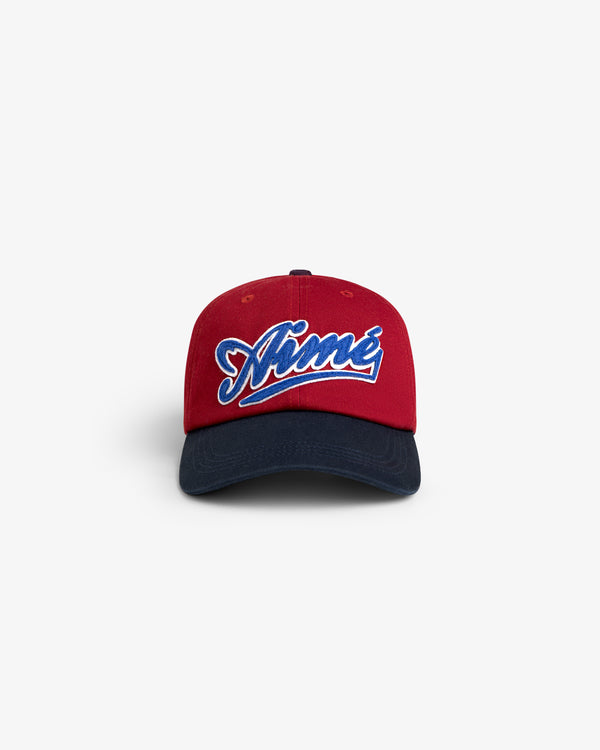 Cycling Logo Hat in red and navy with Aimé embroidered in white and blue script on the front.