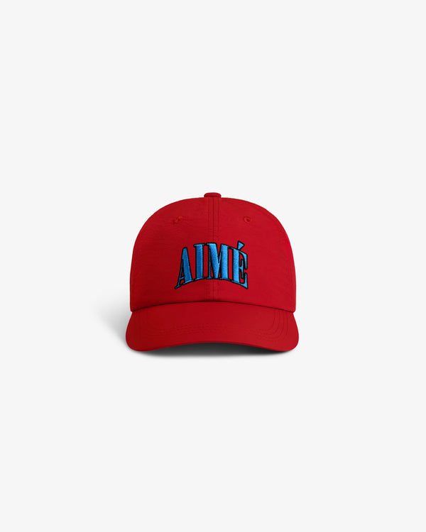 Nylon Crusher Hat with AIMÉ embroidered in large blue letters on the front, shown on a white background.