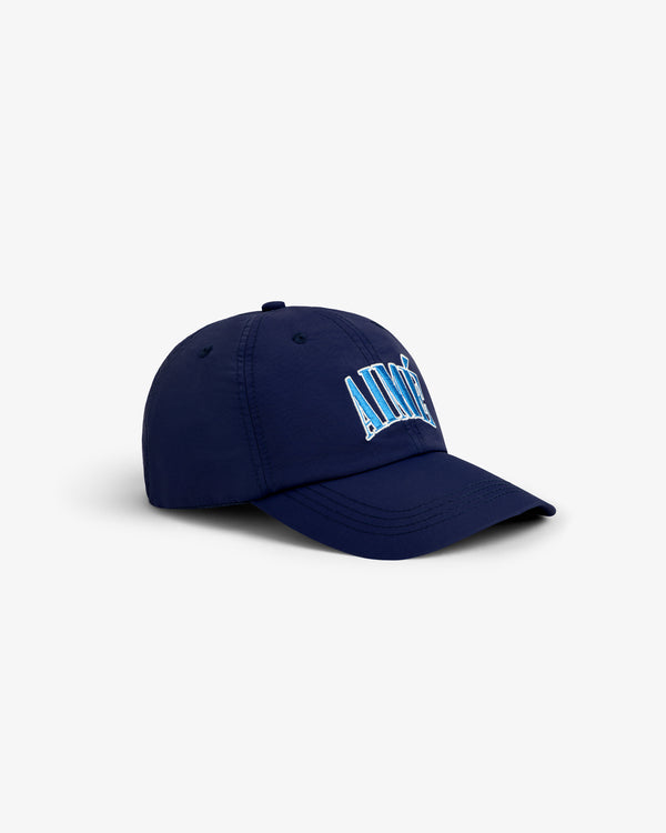 A Nylon Crusher Hat in navy blue with AIMÉ embroidered in light blue and white, shown on a white background.