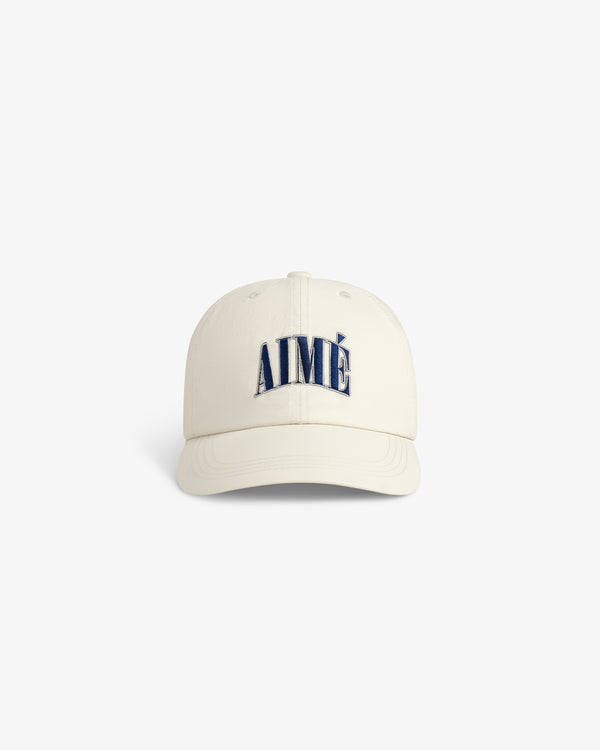 Cream-colored Nylon Crusher Hat with AIMÉ embroidered in bold navy blue on the front, shown on a white background.