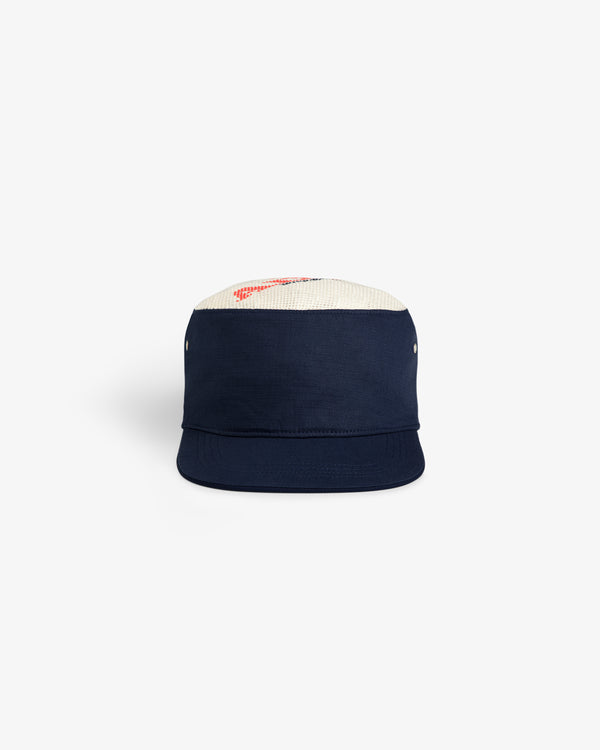 Aimé Painters Hat in navy blue with a white woven top and red design, front view on a white background.