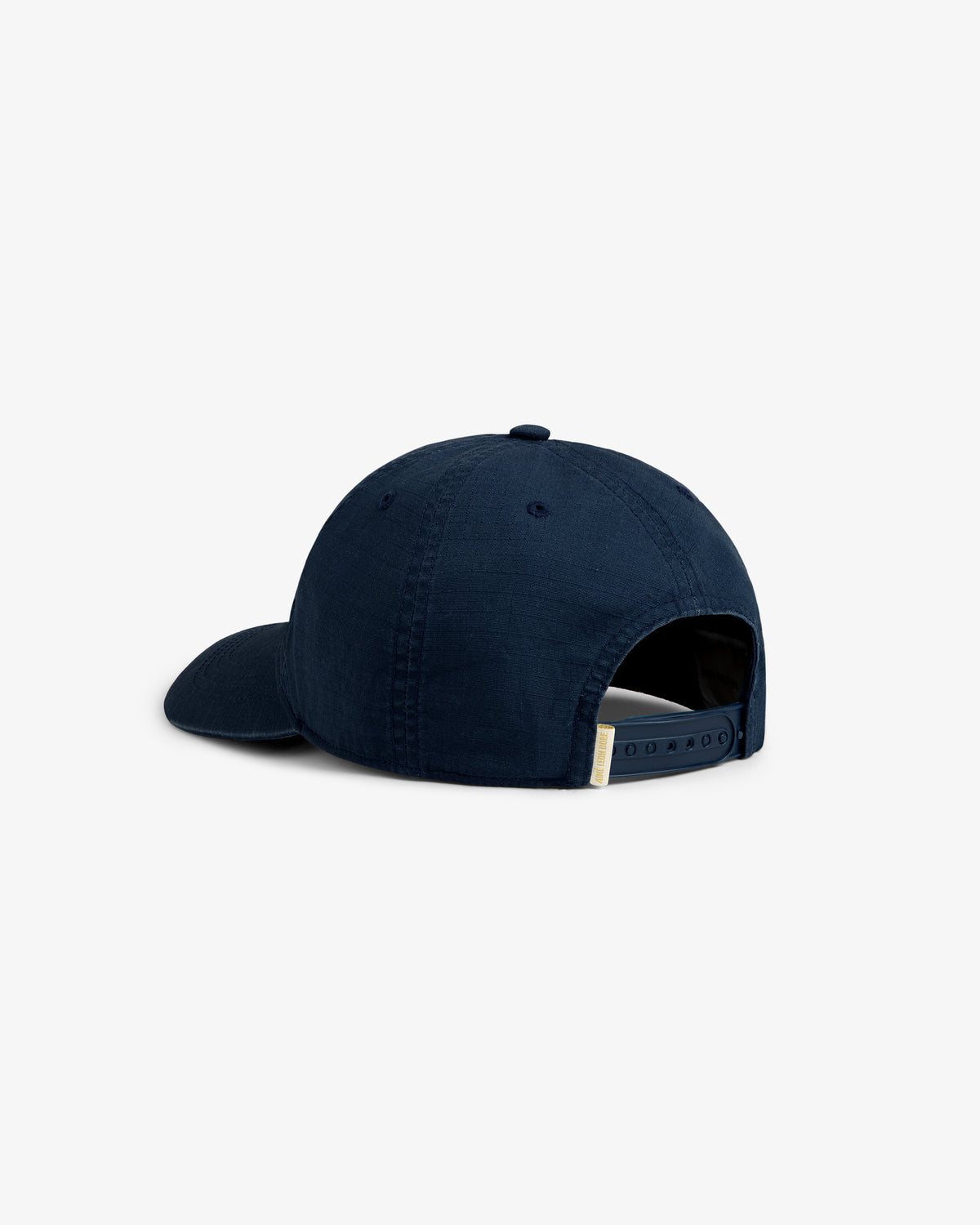 Sun Faded Unisphere Hat in navy, shown from the back with adjustable strap and plain fabric.