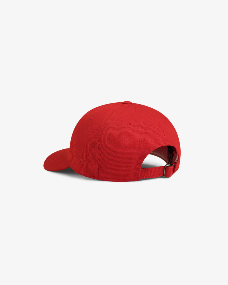 The ALD / New Era Highlanders Retro Fit Hat in red, shown from the back with an adjustable strap and curved brim.