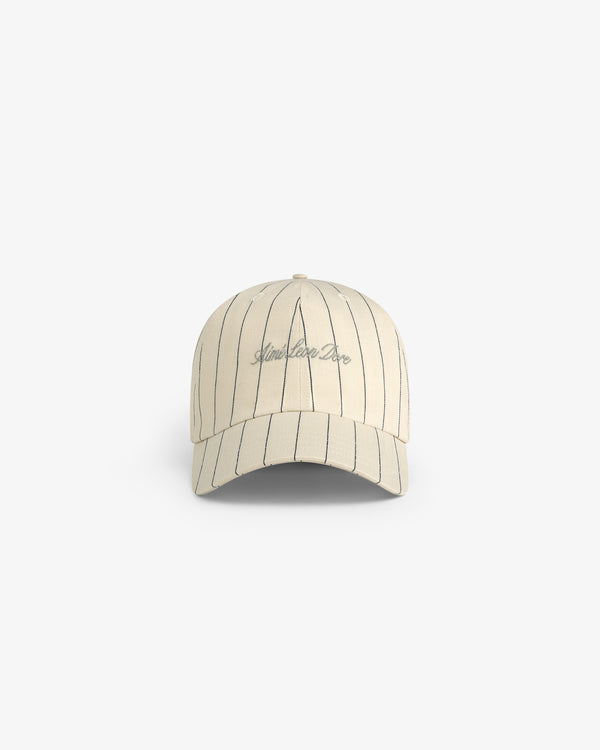 The Pinstripe Suiting Hat features beige fabric, black vertical pinstripes, and Limitless Dose embroidery on the front.