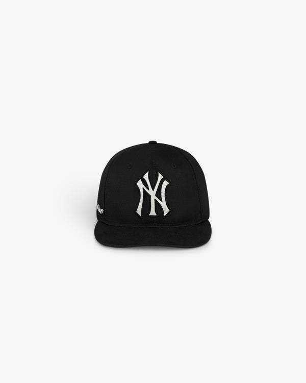 ALD / New York Yankees Retro Fit Hat, black with white NY logo, shown against a plain white background.