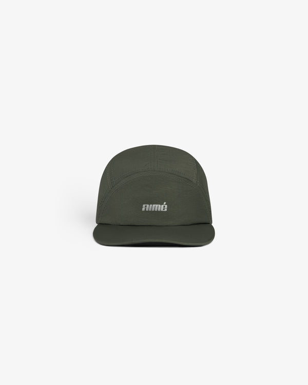 Dark green Aimé Performance Sport Hat with "animé" in white on front, displayed on a plain white background.
