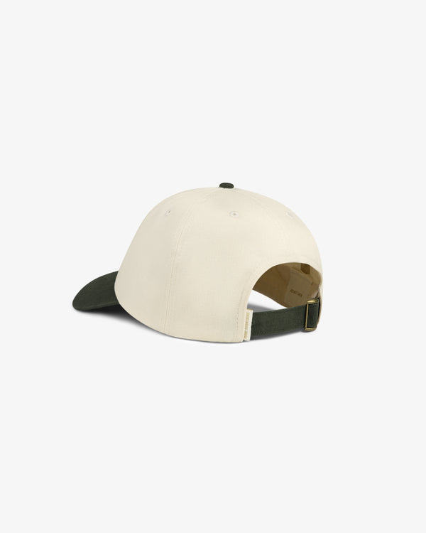 Saint George Logo Hat: beige baseball cap with dark green brim and adjustable strap, shown from the back.