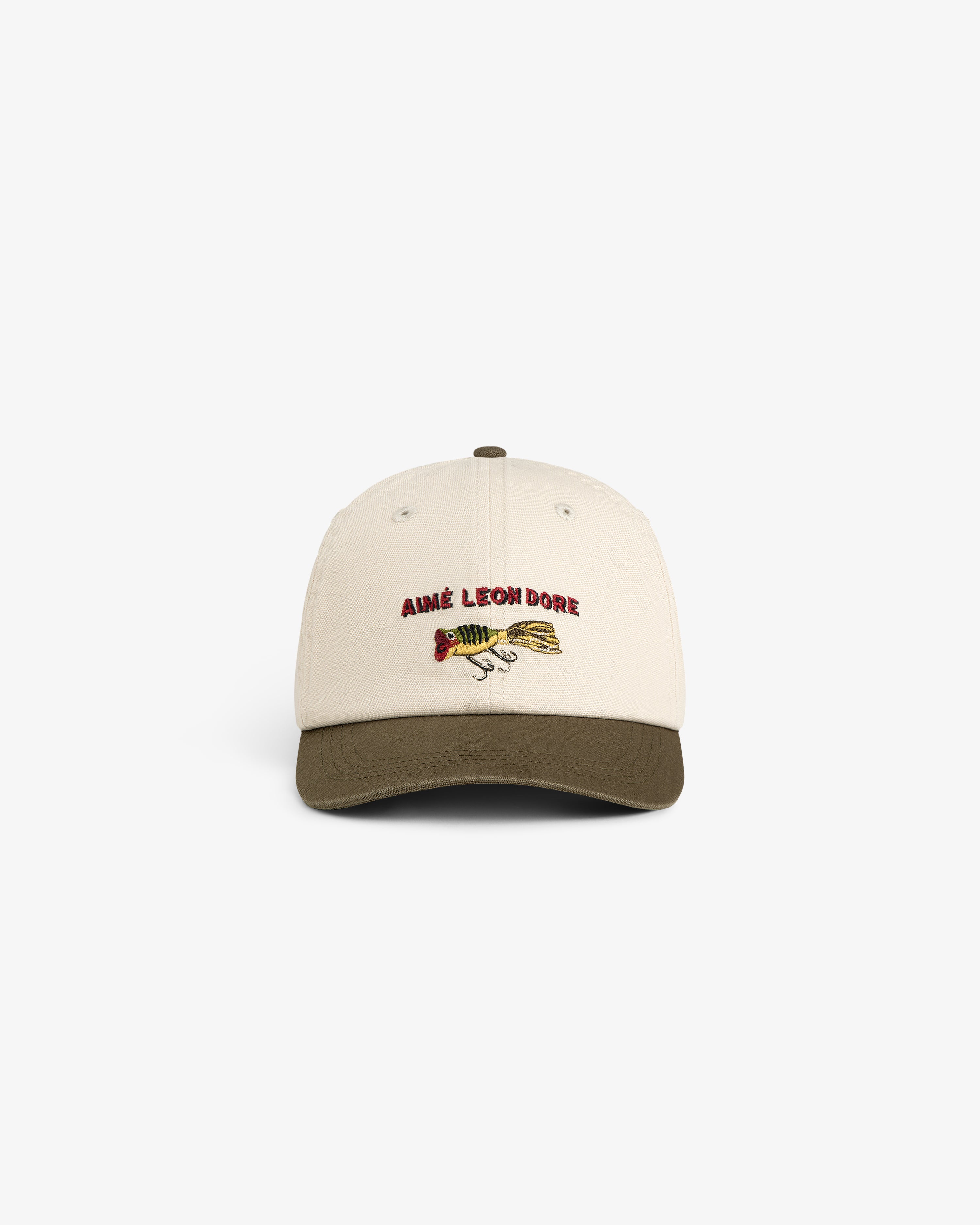 Colorblock Lure Hat: beige cap with olive green brim, Aimé Leon Dore and fish graphic embroidered on front.