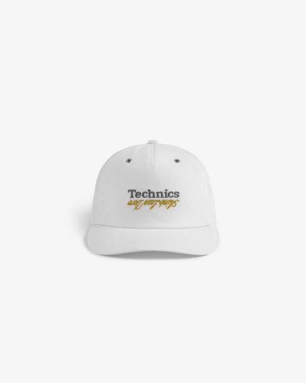White ALD / Technics Nylon Logo Hat with gray Technics and gold all our yesterdays script on front.